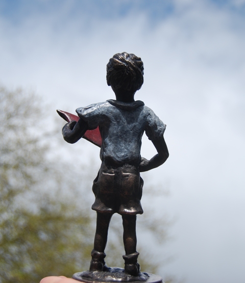 Rear view of sculpture of a boy with a kite by the sculptress JOEL